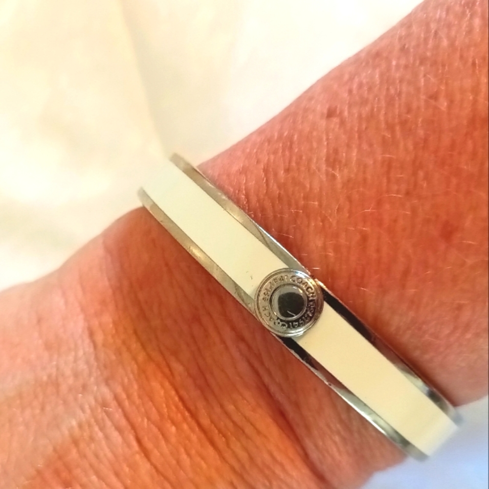 Coach white enamel and silver tone bangle hinge bracelet